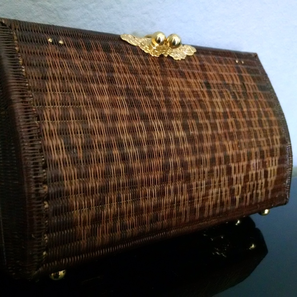 Cool wooden clutch purse with long chain.